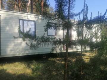 Фото номера Дом с 2 спальнями Дома для отпуска NeriPaulis г. Ažvinčiai 38